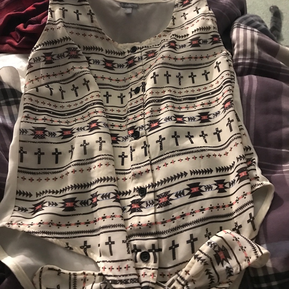 A sleeveless blouse.